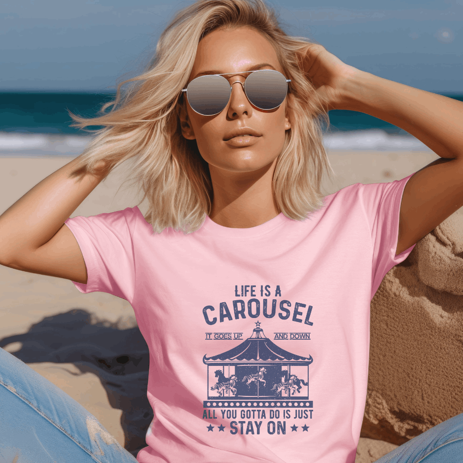 blonde girl wearing pink t-shirt themed as life is  a carousel