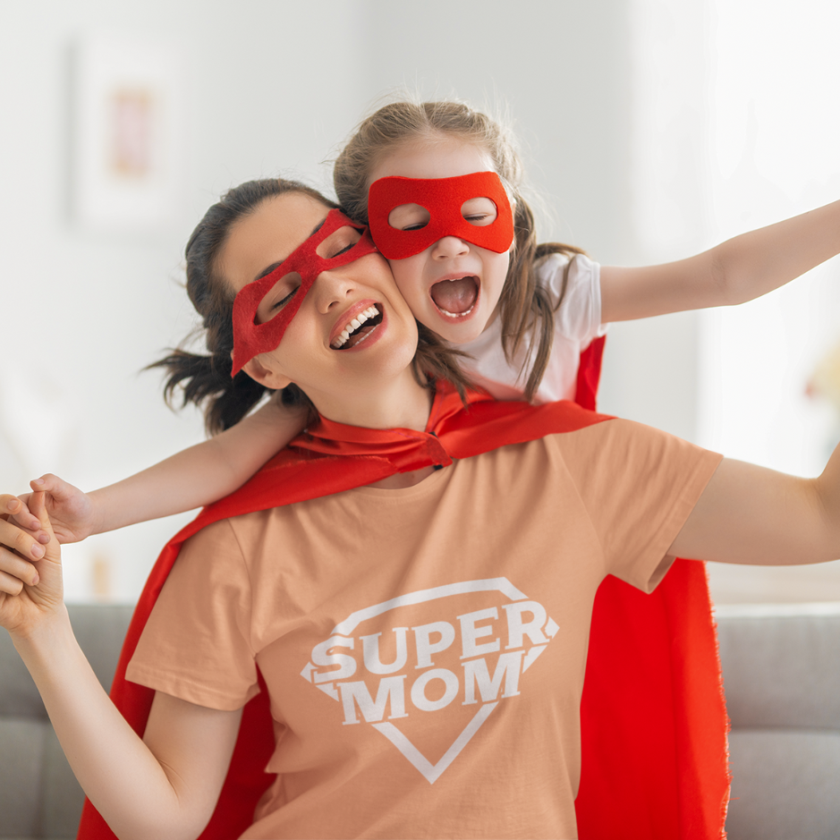 Mother and daughter duo channeling their inner superheroes in our Heather prism sunset Super Mom Tee! 